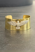 Esclava de bronce con aguila en plata