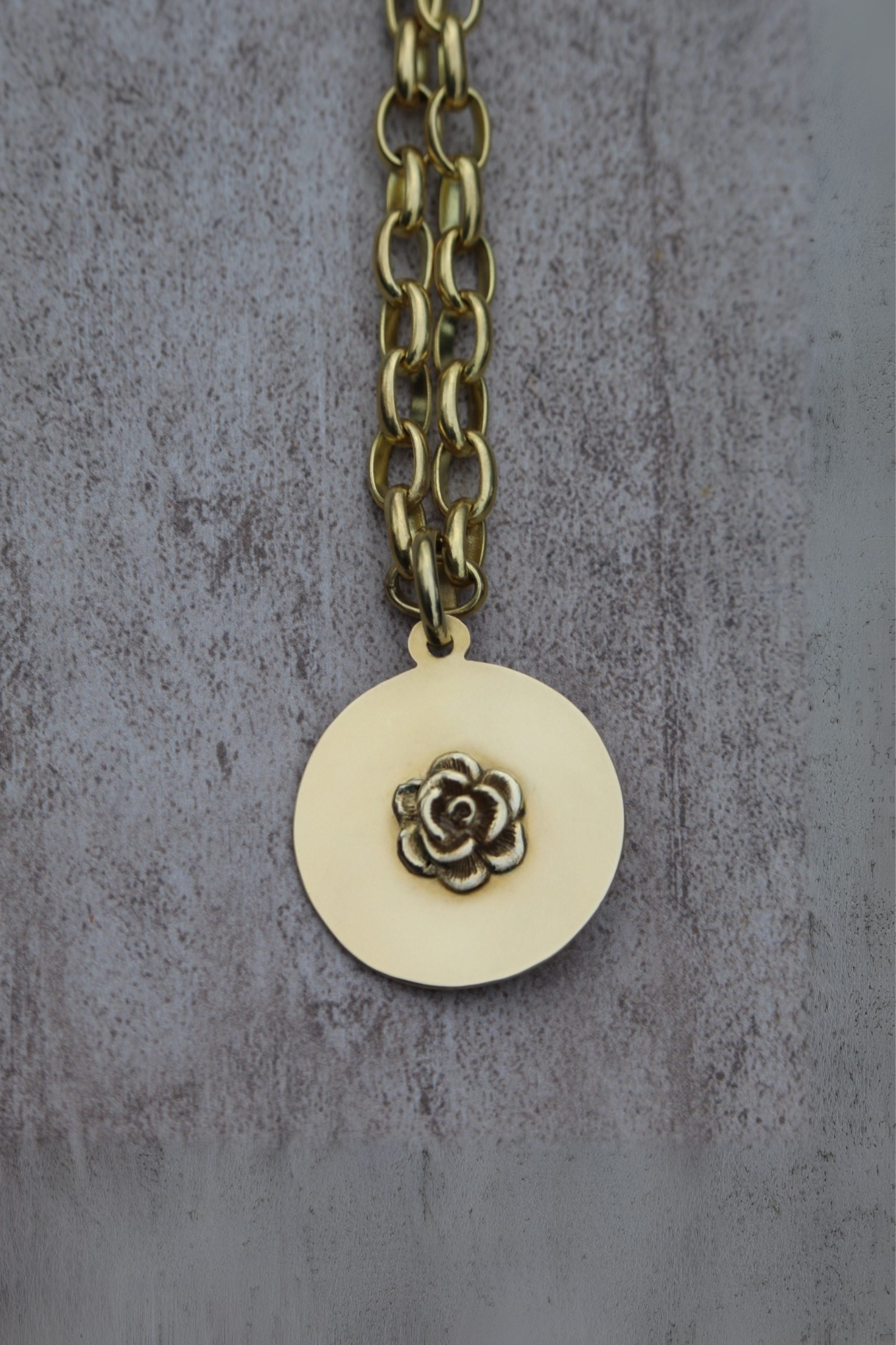Medalla flor bronce
