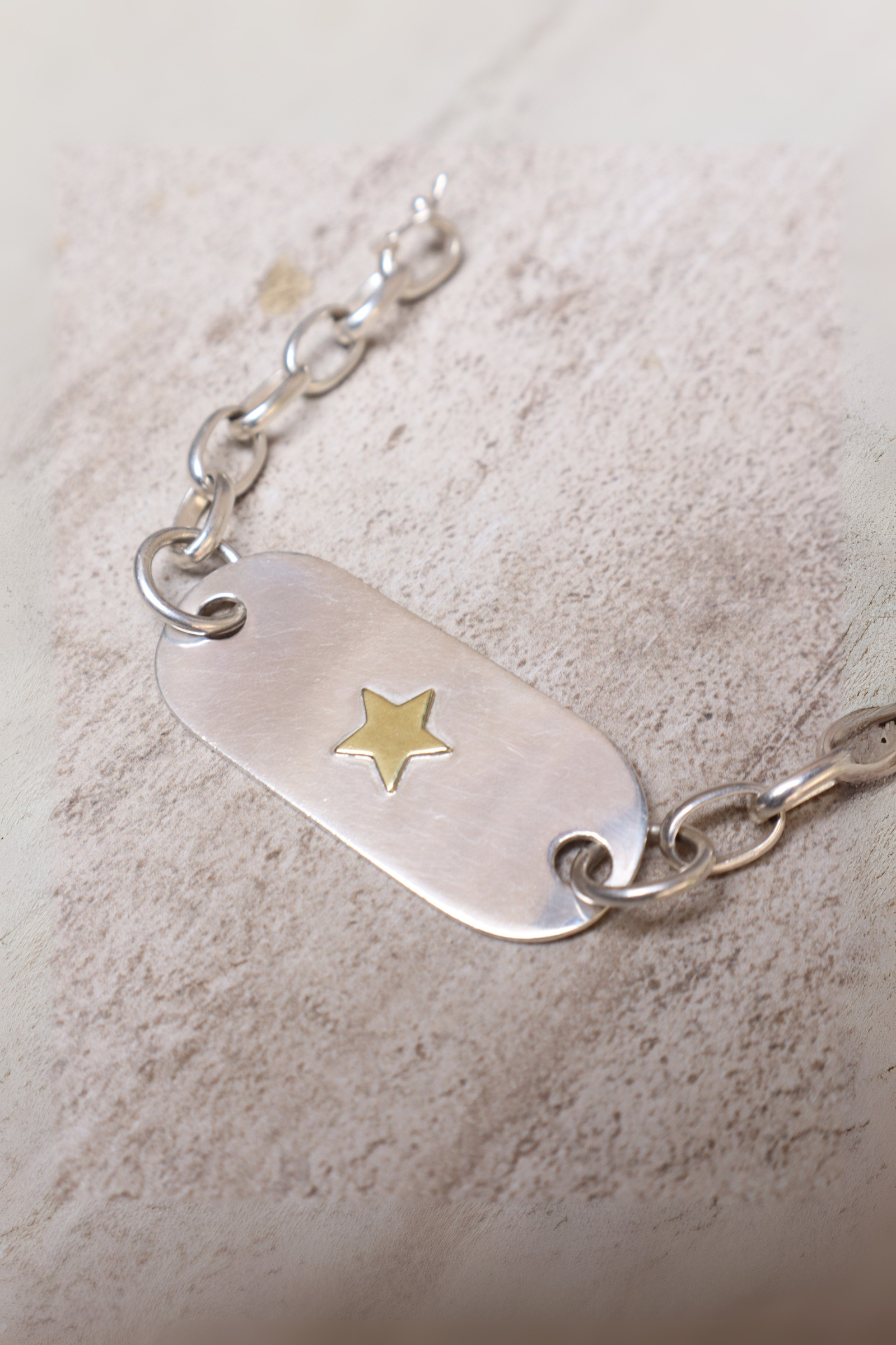 Pulsera placa plata estrella bronce