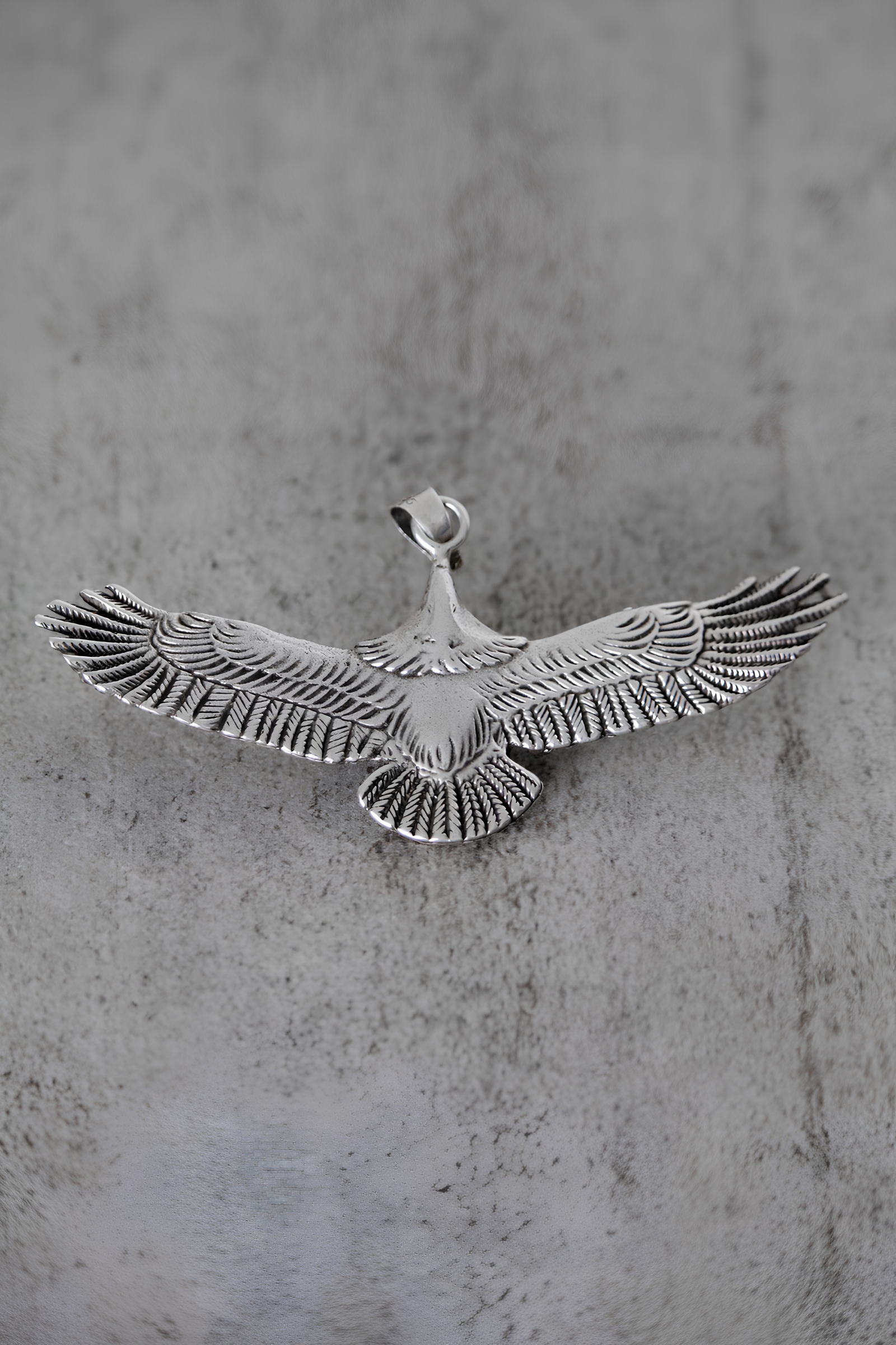 Colgante águila plata