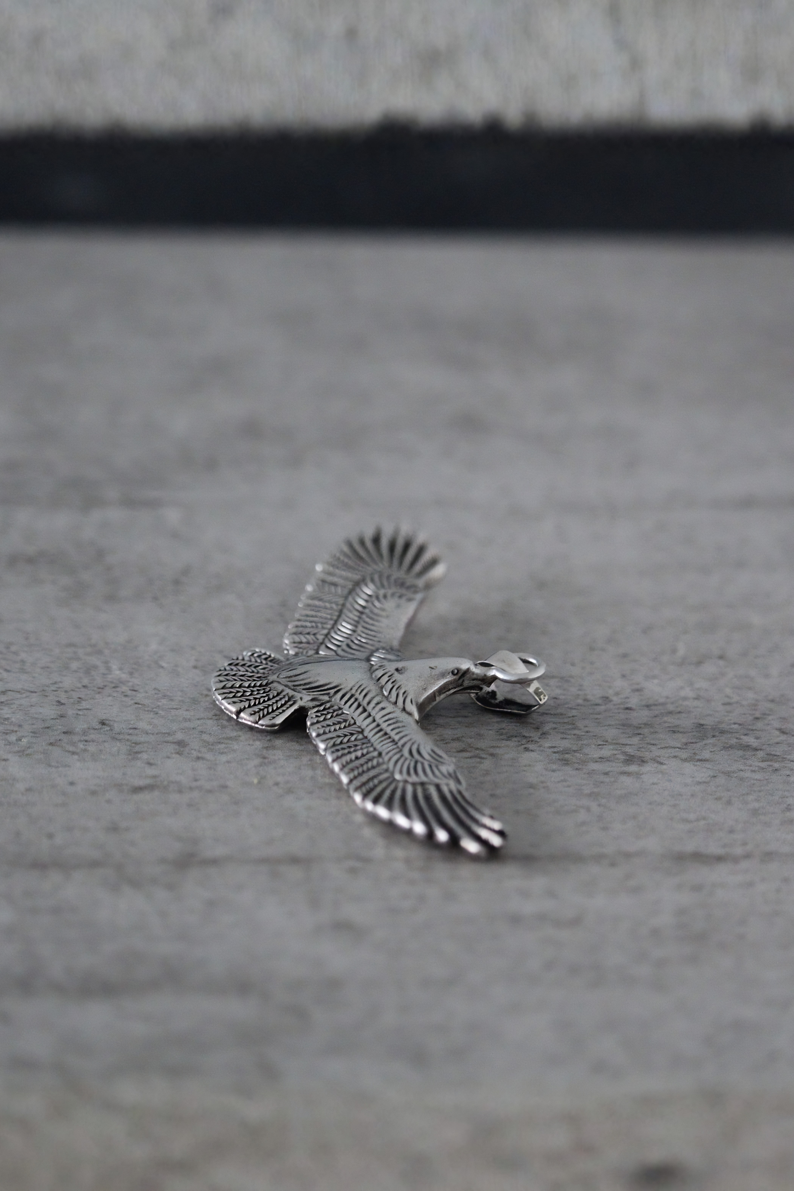 Colgante águila plata