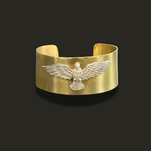 Esclava de bronce con aguila en plata