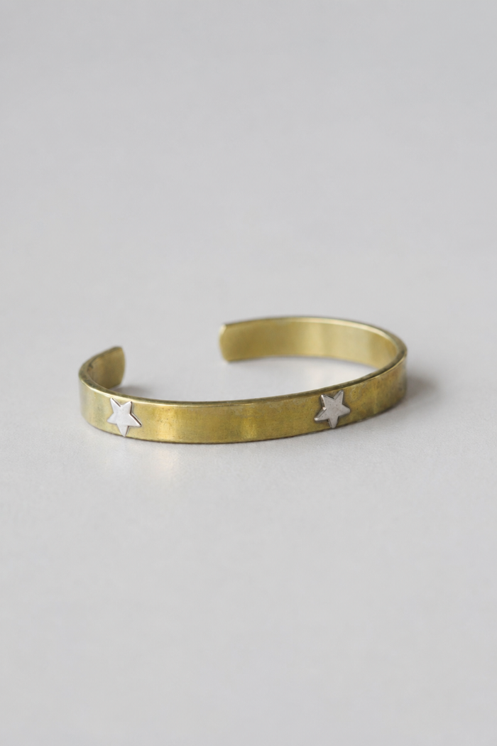 Esclava bronce estrellas plata