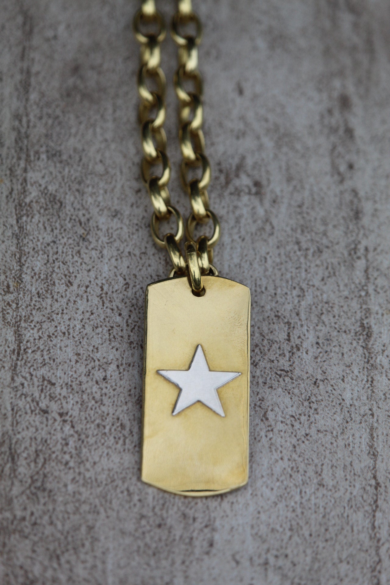 Placa bronce estrella plata