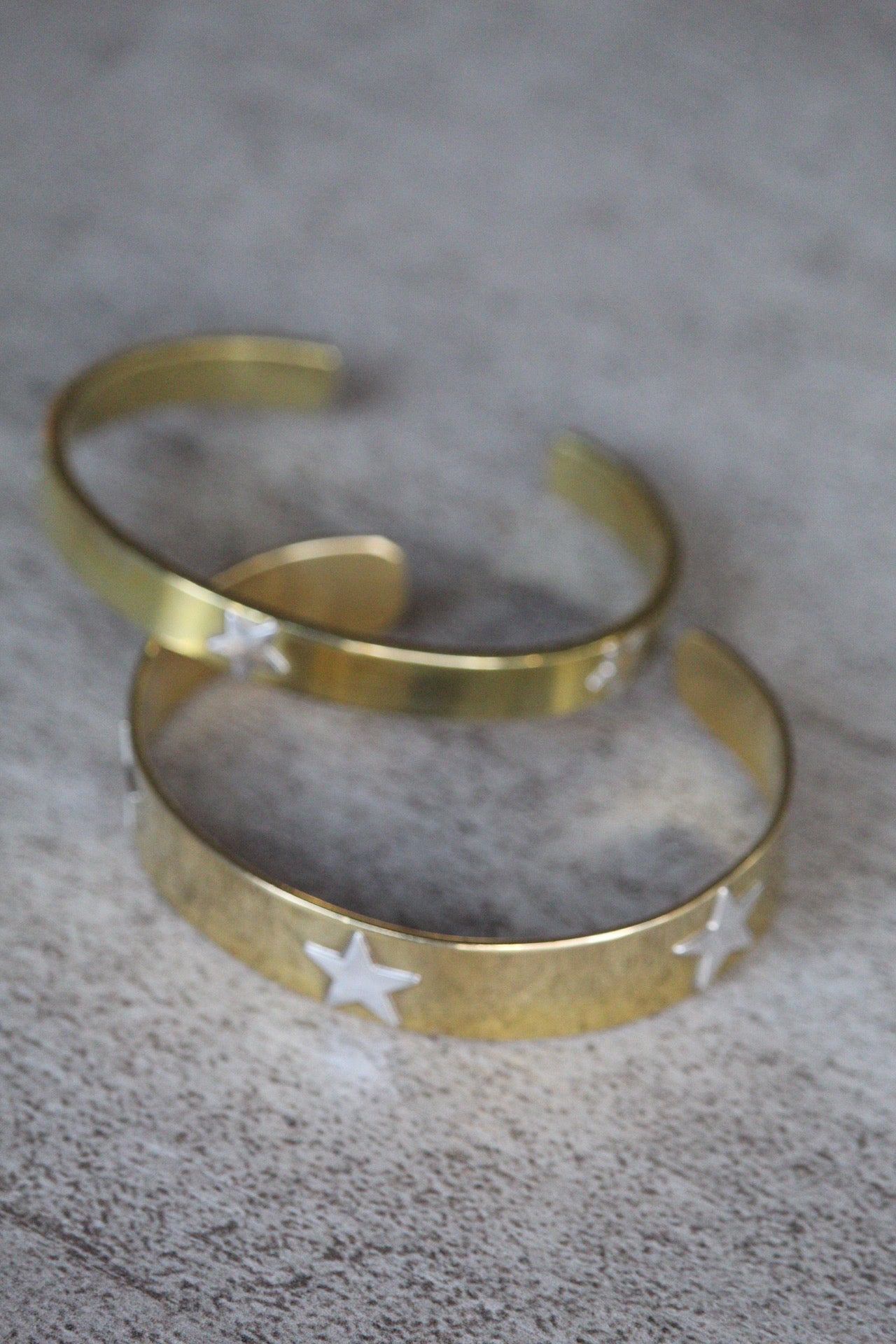 Esclava bronce estrellas plata