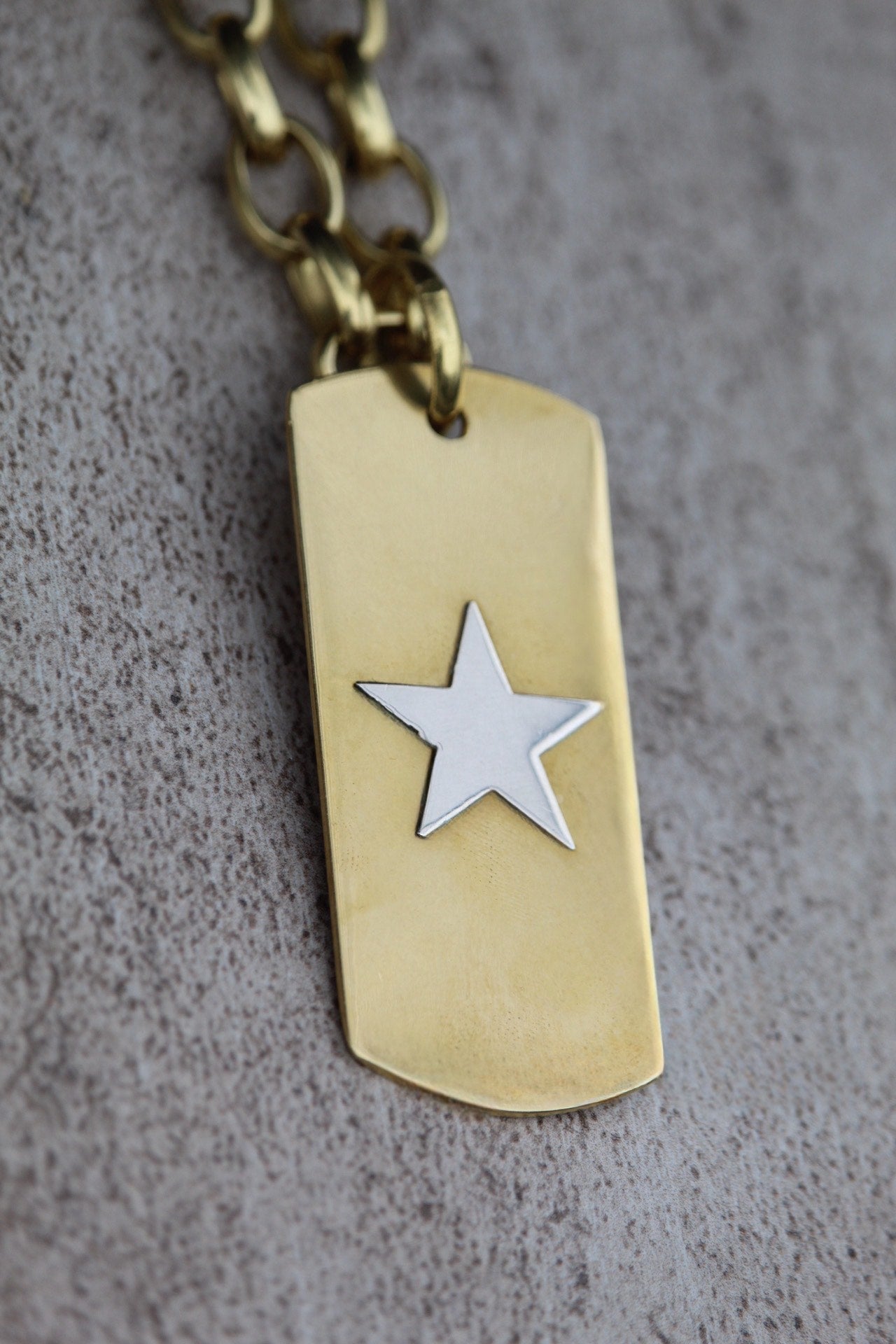 Placa bronce estrella plata